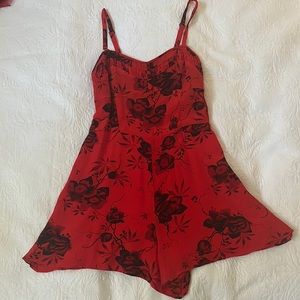 Casual / cute Free people red & black floral romper size 8 w adjustable straps